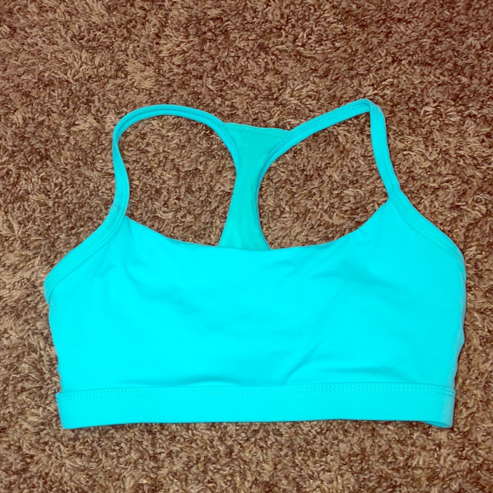 Teal Fabletics sports bra
